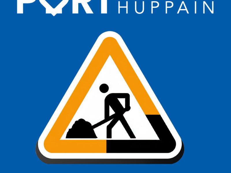 Panneau de signalisation de travaux sur fond bleu, affichant un triangle jaune avec une icône noire représentant une personne en train de creuser. Au-dessus 1